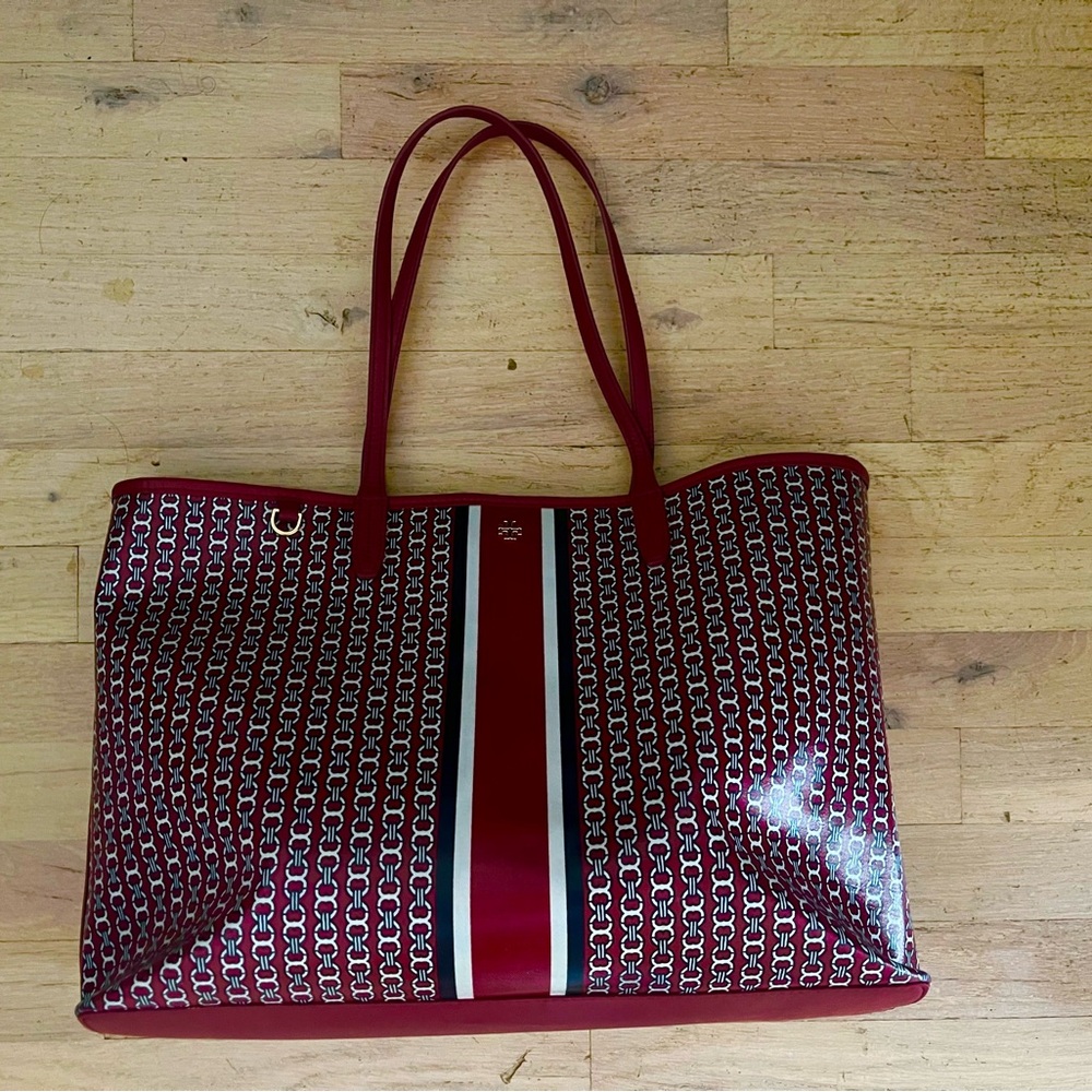 Tory Burch Elegant Patterned Tote Bag in Burgundy and Navy Blue.